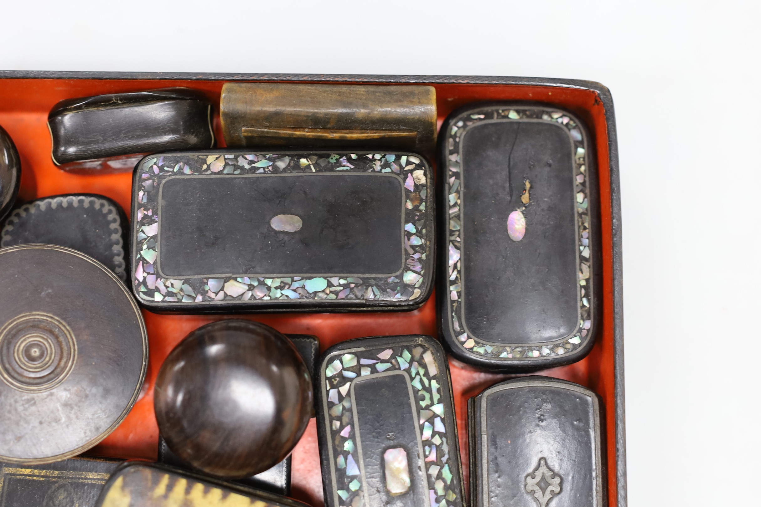 A collection of Victorian papier mache snuff boxes and a Tunbridge ware pin wheel